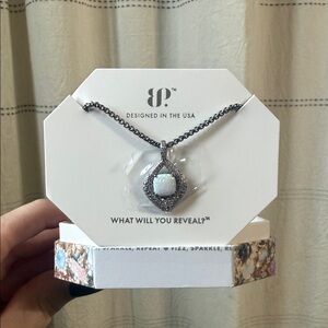 Elegant Silver Necklace with Opal Pendant